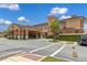 Beautiful Regal Oaks Clubhouse with covered entry and well-maintained landscaping at 2621 Corvette Lane, Kissimmee, FL 34746