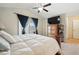 Well-lit main bedroom featuring a vaulted ceiling, private balcony, and ample closet space at 2920 Windmill Dr, Kissimmee, FL 34741