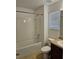 Bathroom featuring a shower-tub combo, tile flooring, and a granite countertop sink at 2921 Puerta Del Sol Blvd, Kissimmee, FL 34744