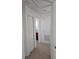 Hallway with carpet, closet, and bathroom at 2921 Puerta Del Sol Blvd, Kissimmee, FL 34744