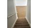 Carpeted staircase leading downstairs to the main level of the home at 2921 Puerta Del Sol Blvd, Kissimmee, FL 34744