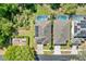 Aerial view of two homes, one with solar panels and a screened-in pool at 2958 Sunset Vista Blvd, Kissimmee, FL 34747