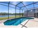 Relaxing screened-in pool with lake views at 561 Las Fuentes Dr, Kissimmee, FL 34747