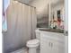 Bathroom featuring a vanity and a shower with a shower curtain at 624 Sardinia Circle, Davenport, FL 33837