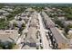 Overhead view displays long rows of neatly arranged, colorful townhomes in a well-maintained community at 6659 Times Square Ave 38-103 # Orlando, Orlando, FL 32835