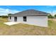 Spacious backyard featuring a concrete patio and ample space for outdoor activities at 101 Sail Way, Kissimmee, FL 34759