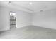 Bedroom featuring modern recessed lighting, and a view into the ensuite bathroom at 101 Sail Way, Kissimmee, FL 34759