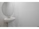A bathroom featuring a stylish sink and mirror at 1035 Wisteria Way, Dundee, FL 33838
