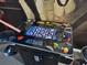 Close-up of the arcade game machine, featuring iconic classic games, perfect for entertainment at 1057 Castle Pines Ct, Reunion, FL 34747