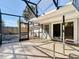 Spacious screened patio with tile flooring and convenient access to the backyard at 1085 Whitewood Dr, Deltona, FL 32725