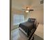 Nicely lit bedroom featuring ceiling fan and window letting in natural light at 12 E Murphy E St, Davenport, FL 33837