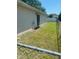 Spacious backyard with partial fence, offering privacy and room for outdoor activities at 1304 Mill Creek Pl, Kissimmee, FL 34744