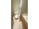 Cozy bathroom featuring modern vanity, toilet, and tiled floor at 1304 Mill Creek Pl, Kissimmee, FL 34744