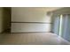 Bright dining area with tiled floor, neutral paint, and sliding glass door, perfect for entertaining at 1304 Mill Creek Pl, Kissimmee, FL 34744