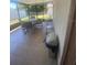 Screened patio with tiled floor, perfect for outdoor entertaining at 1304 Mill Creek Pl, Kissimmee, FL 34744