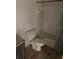 Clean bathroom view of a toilet, shower, and cabinets at 14049 Fairway Island Dr # 122, Orlando, FL 32837