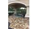 Community hot tub with a covered area and ample seating around, creating a relaxing atmosphere at 14049 Fairway Island Dr # 122, Orlando, FL 32837