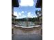 Beautiful water fountain feature enhancing the community pool area at 14049 Fairway Island Dr # 122, Orlando, FL 32837