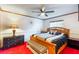 Comfortable bedroom with a ceiling fan, decorative touches, and lots of natural light at 2429 Oak Run Blvd, Kissimmee, FL 34744