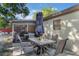 Backyard patio with an outdoor dining set and space for relaxing and entertaining at 2429 Oak Run Blvd, Kissimmee, FL 34744