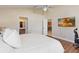 Spacious bedroom with wood flooring, updated ensuite bathroom and television for relaxing at 2706 Sebastian Ct, Kissimmee, FL 34743