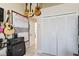 Clean room with white closet doors and guitars hung on the wall at 2706 Sebastian Ct, Kissimmee, FL 34743