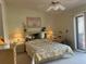 Bright bedroom with a comfortable bed, neutral tones, and natural light, creating a serene and inviting space at 2809 Wingfoot Ct, Winter Haven, FL 33884