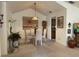 Dining area features a glass table, 4 chairs, and a large open feel at 2809 Wingfoot Ct, Winter Haven, FL 33884