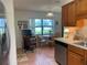 Bright eat-in kitchen featuring stainless appliances and a cozy breakfast nook at 2809 Wingfoot Ct, Winter Haven, FL 33884