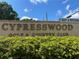 Elegant Cypresswood Golf & Country Club signage surrounded by lush landscaping, marking the entrance to the community at 2809 Wingfoot Ct, Winter Haven, FL 33884
