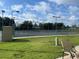 Outdoor tennis courts with well-maintained surfaces and ample lighting at 2809 Wingfoot Ct, Winter Haven, FL 33884
