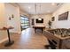 Well-appointed game room with a pool table, foosball, and a sleek, modern design, perfect for indoor fun at 3409 Lake Diane Rd, Tavares, FL 32778