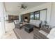 Inviting outdoor patio with fire pit, perfect for entertaining and enjoying the fresh air at 3409 Lake Diane Rd, Tavares, FL 32778