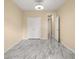 Empty bedroom featuring stylish tile flooring and plenty of natural light at 3637 Rothbury Dr, Belle Isle, FL 32812