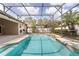The pool with a screened-in enclosure overlooks the backyard and is great for outdoor enjoyment at 3637 Rothbury Dr, Belle Isle, FL 32812