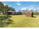 Expansive backyard featuring lush lawn and brick building at 3970 Kissimmee Park Rd, St Cloud, FL 34772