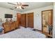 Bedroom with wood floors, ample closet space and an attached bathroom at 3970 Kissimmee Park Rd, St Cloud, FL 34772