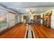 Spacious bonus room with hardwood floors, built-in bookcases and lots of natural light at 3970 Kissimmee Park Rd, St Cloud, FL 34772