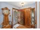 Inviting foyer featuring hardwood floors and a vintage decor at 3970 Kissimmee Park Rd, St Cloud, FL 34772