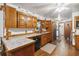 Functional kitchen with wood cabinets, ample counter space, and modern appliances at 3970 Kissimmee Park Rd, St Cloud, FL 34772