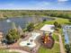 Aerial view of community splash pad, playground, lake, volleyball and tennis courts at 4561 Yellowgold E Rd # 107, Kissimmee, FL 34746