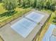 Aerial view of tennis courts in the community at 4561 Yellowgold E Rd # 107, Kissimmee, FL 34746