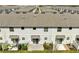 Backyard of townhome featuring a patio area, lawn and new fencing at 4672 Tribute Trl, Kissimmee, FL 34746