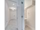 Stylish half-bathroom with pedestal sink, tile floors, and modern fixtures at 4672 Tribute Trl, Kissimmee, FL 34746