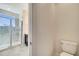 Bathroom features a walk-in shower and toilet at 4672 Tribute Trl, Kissimmee, FL 34746