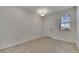 Inviting entryway with light tile floors, and a modern front door at 4672 Tribute Trl, Kissimmee, FL 34746