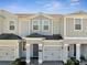 Charming townhome with brick driveway and one car garage at 4672 Tribute Trl, Kissimmee, FL 34746