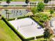 Community amenities featuring basketball court, beach volleyball, and meticulously maintained landscaping at 4672 Tribute Trl, Kissimmee, FL 34746