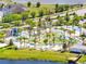 Aerial view of community water park, featuring pools, lazy river, mini golf and Gathering activities at 4672 Tribute Trl, Kissimmee, FL 34746