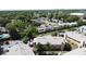 Aerial view of neighborhood with mature trees and attractive residential buildings at 4858 S Semoran Blvd # 2108, Orlando, FL 32822